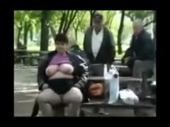 Big beautiful woman girl of mine likes flashing her cool belly and biggest bazookas in park